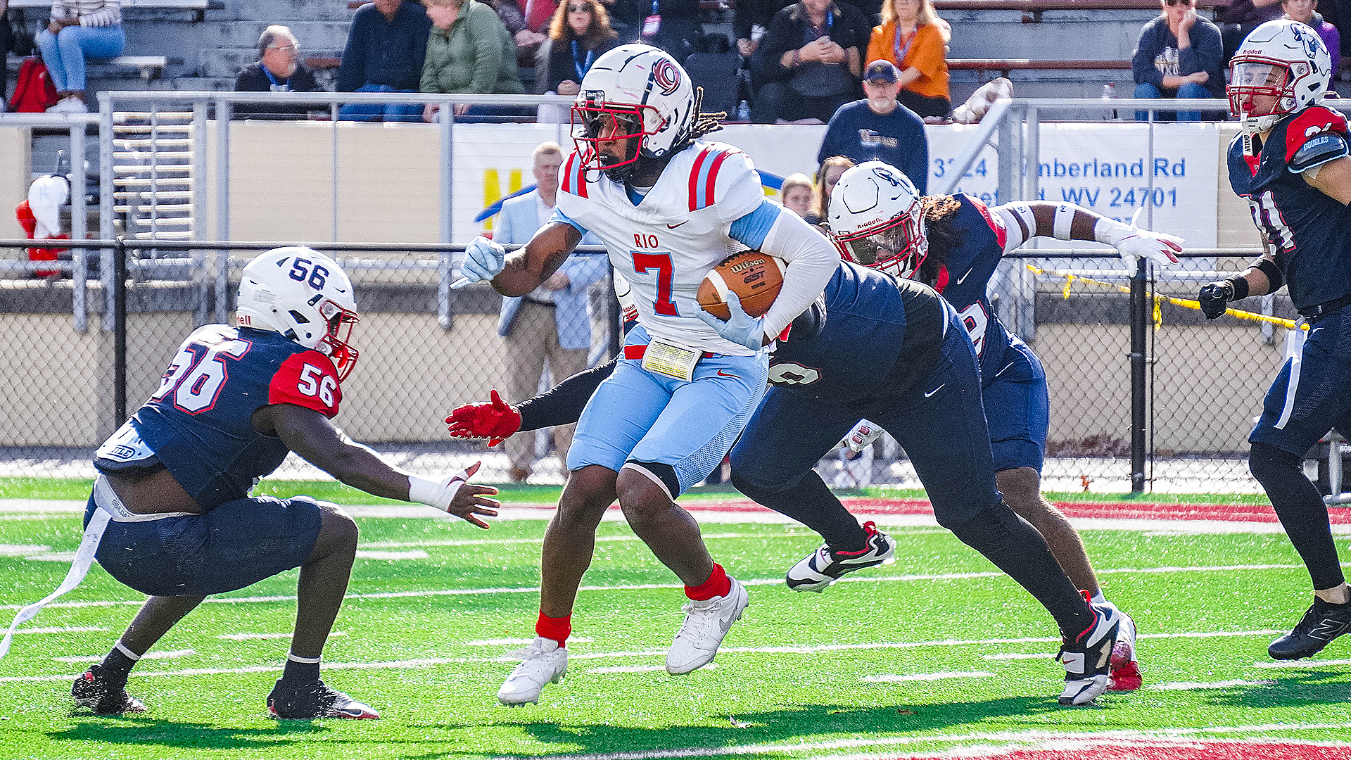 Rio Grande's Devon Head tries to elude a pair of Bluefield defenders during Saturday's 38-21 loss to the Rams.