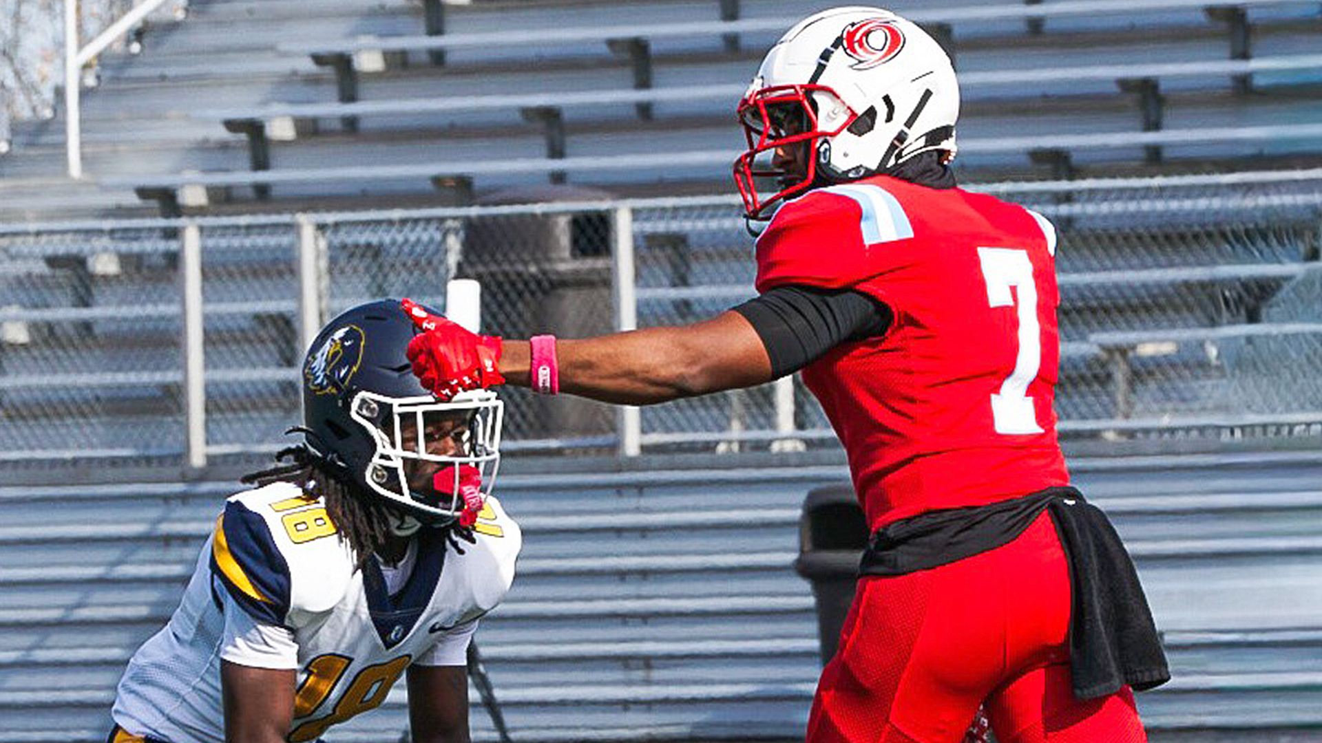 Rio Grande's Devon Head signals he's ready before the snap of the ball during the first half of Saturday's 56-0 loss to Reinhardt (Ga.) University in Jackson, Ohio.