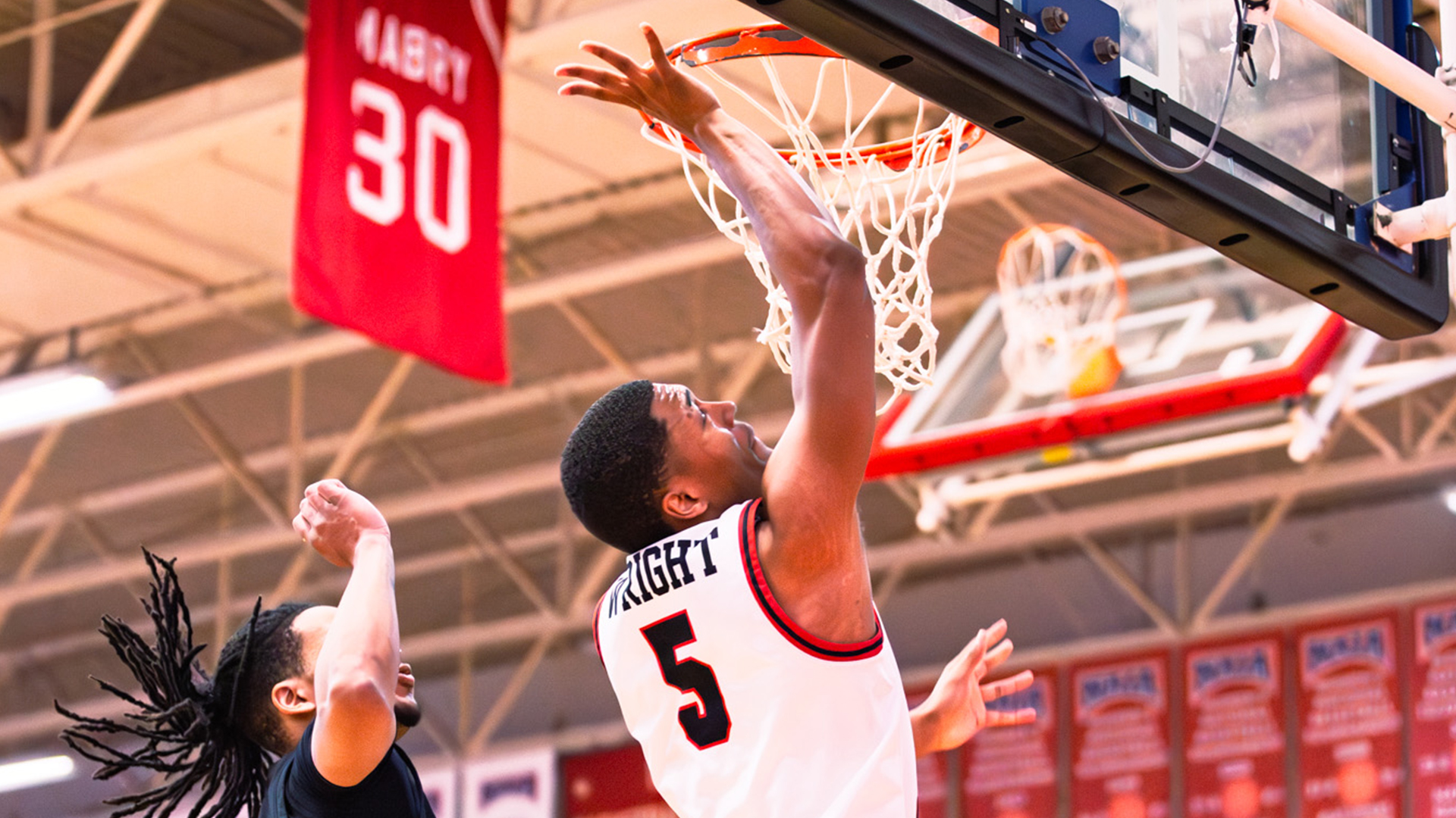 Rio Grande's James Wright drives in for a bucket during the first half of Thursday night's 74-71 loss to Midway at the Newt Oliver Arena.