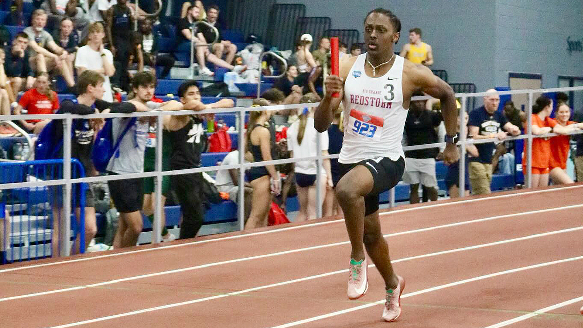 Rio Grande's Noah Sileshi runs in the preliminary round of the 4x400 relay during Thursday's action the NAIA Men's Indoor Track & Field Championships in Gainesville, Fla.