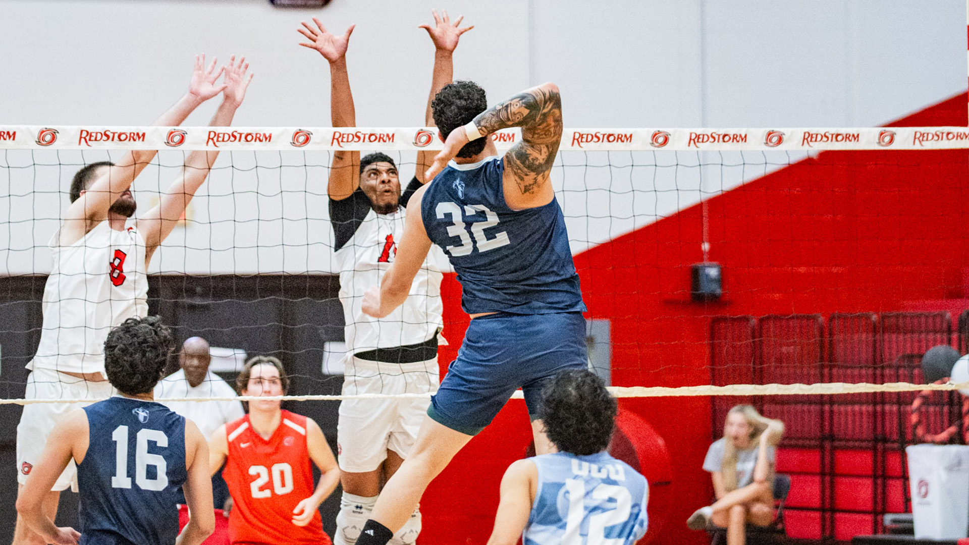 Rio Grande's Josef Iten (left) and Daniel Rivas (right) attempt to block an attack during Saturday's match at the Newt Oliver Arena.