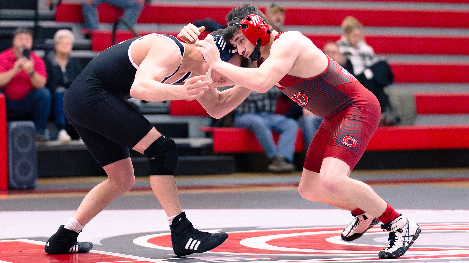 Rio Grande's Josh Morrison battles Caleb Thomas of Campbellsville University in a 125-pound match as part of Friday night's dual at the Newt Oliver Arena.