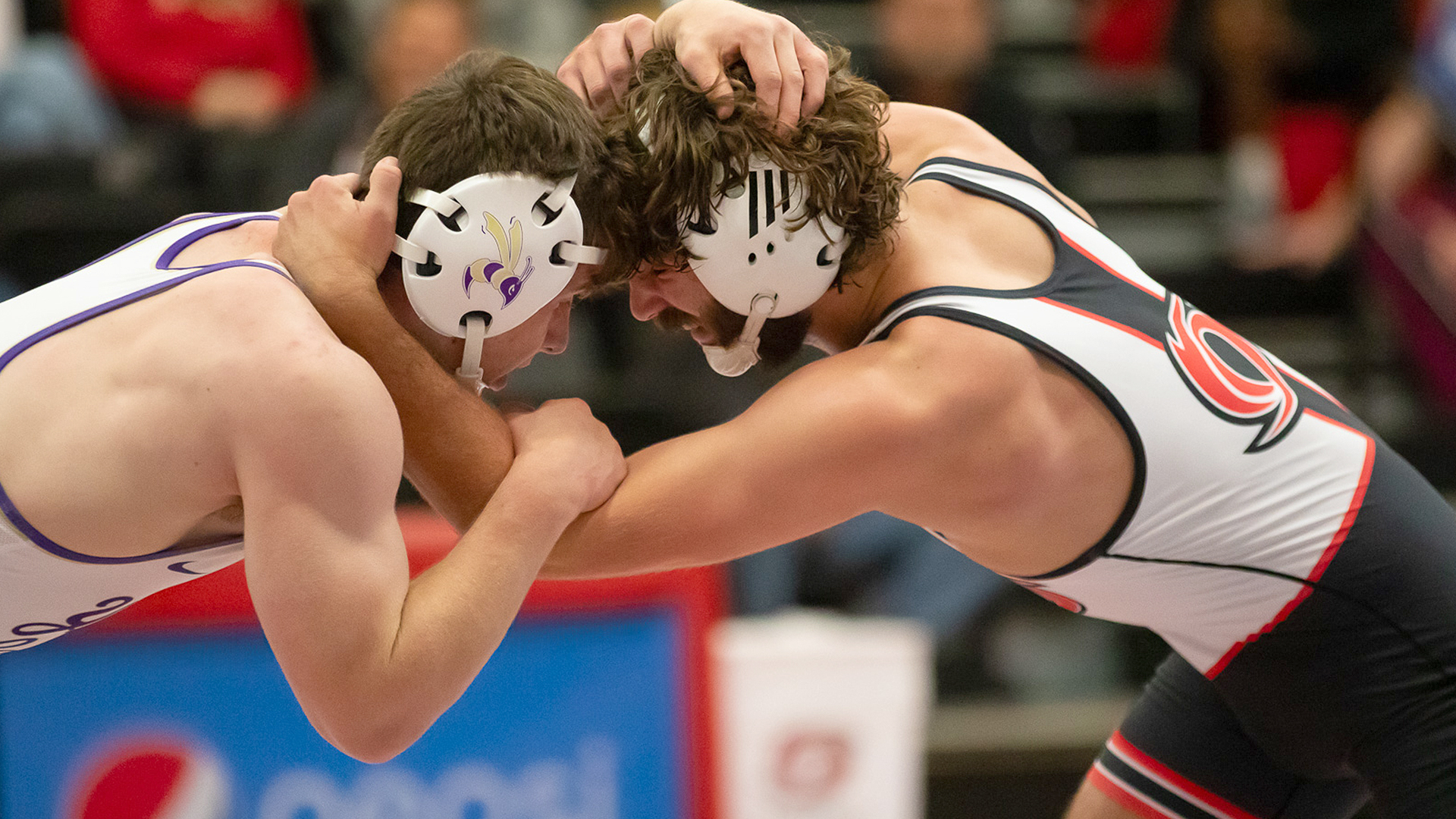 Rio Grande's Pate Eastin battles Defiance's Graiden Troth in their 165-pound match as part of Friday night's tri-match which also included WVU-Tech at the Newt Oliver Arena. Eastin won a 5-0 decision over Troth.