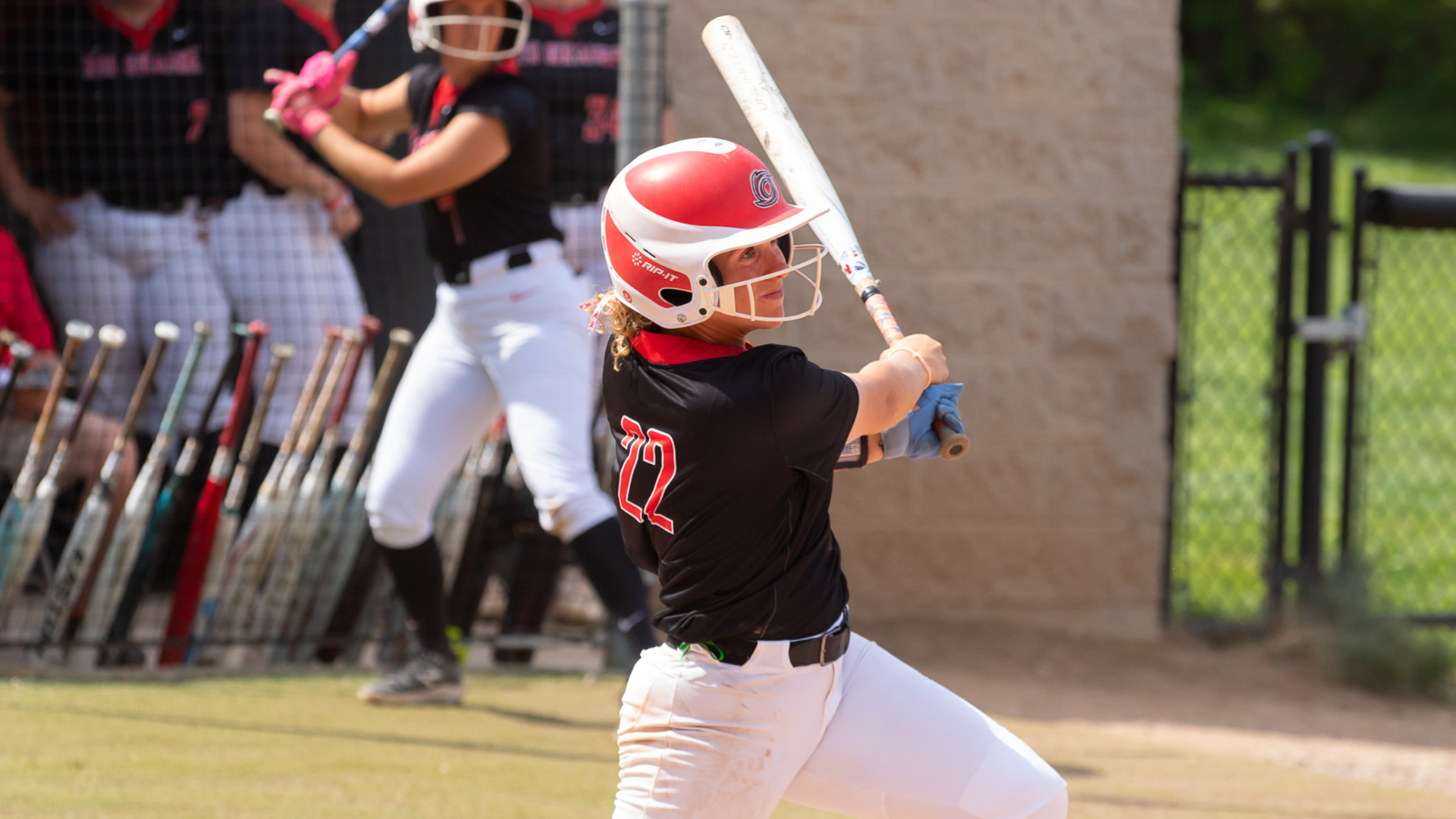 Rio Grande's Emily Lane connects for a two-run single in Friday's game two win over Shawnee State at Rio Softball Park.