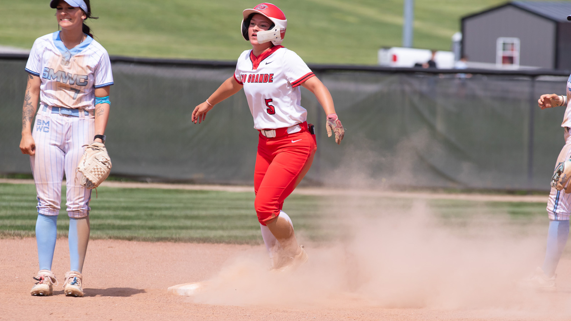 Rio Grande's Kendyl Moss looks back toward home plate after sliding into second base during Friday's game one win over St. Mary-of-the-Woods College at Rio Softball Park.