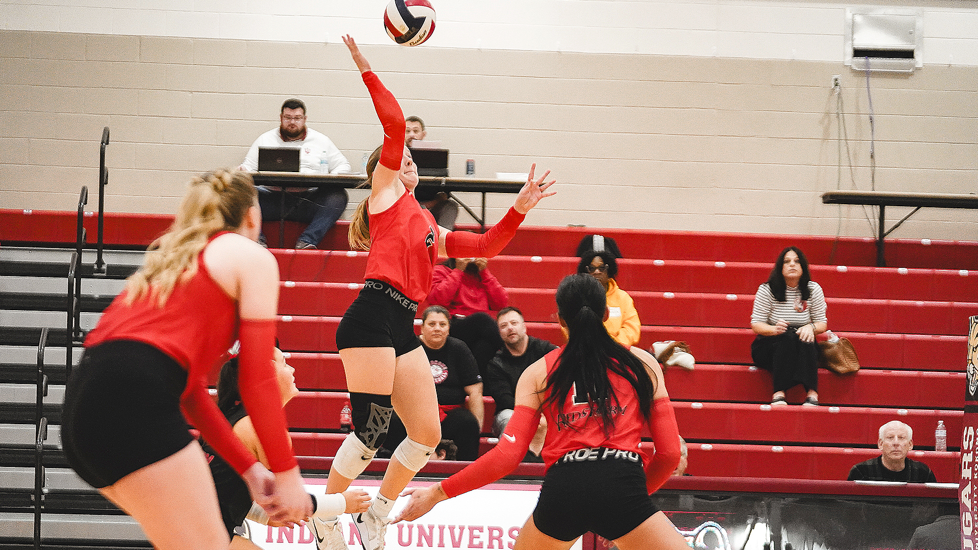 Rio Grande's Taylor Bartrum sends back an attack during Friday's five-set win over St. Mary-of-the-Woods College in the semifinal round of the River States Conference Women's Volleyball Championship in Kokomo, Ind.