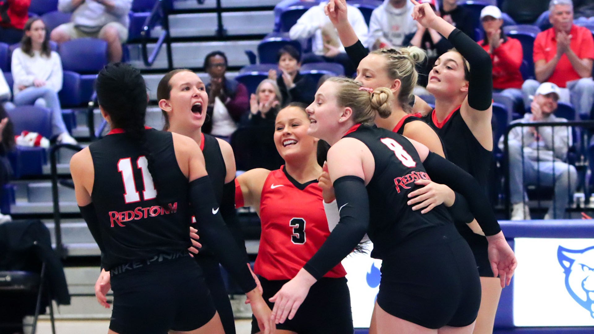 The Rio Grande women's volleyball team celebrates a point during the first set of Saturday's 3-0 loss at Mount Vernon Nazarene in the opening round of the NAIA National Championship.