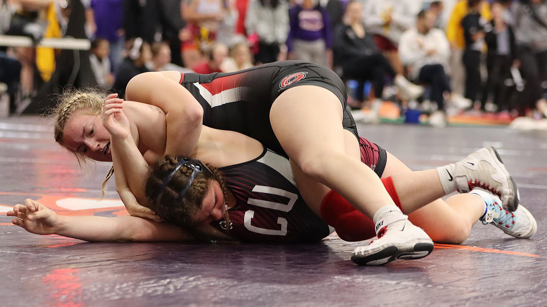Rio's Paige Russell works toward pinning Campbellsville's Aubree Avery during action in the Missouri Valley Open.